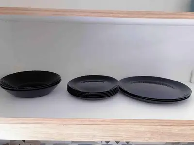 two black plates sitting on top of a shelf at Paleo Faliro Athens fully equipped 2 bedrooms 90 sqm big apartment 200m to Free beach in Athens