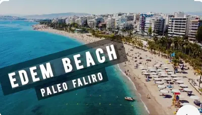 an aerial view of a beach with people and the ocean at Paleo Faliro Athens fully equipped 2 bedrooms 90 sqm big apartment 200m to Free beach in Athens