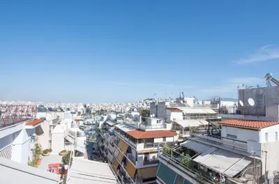 an aerial view of a city with buildings at Vicky's Sky Loft in Piraeus