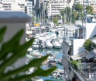 a group of boats docked in a marina at Vicky's Sky Loft in Piraeus