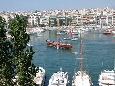 a group of boats are docked in a harbor at Mia's Seaside Penthouse - Panoramic View in Piraeus