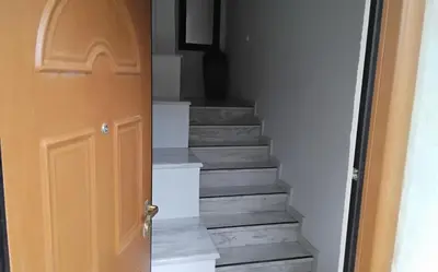 a door leading up to a set of stairs at Peaceful oasis in Athens