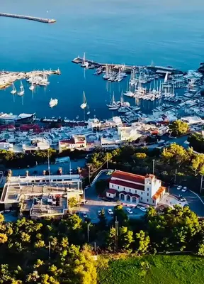 an aerial view of a marina with boats in the water at PORT TWINS SUITES No1 in Piraeus
