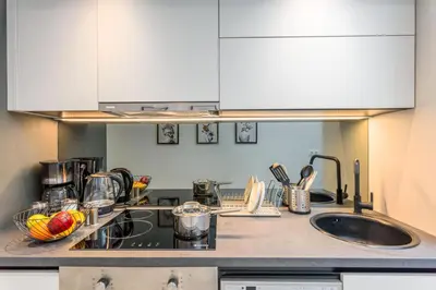 a kitchen with a sink and a counter top at Penelope Charming 2Bedroom Apartment in Athens in Athens