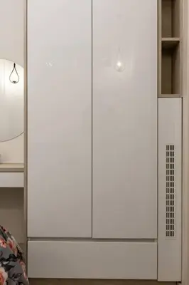a white cabinet with a light on top of it at The Golden home 1 in Piraeus