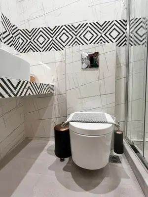 a bathroom with a toilet and a shower at Green House near Athens Center in Athens