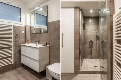 a bathroom with a toilet sink and a shower at Mystique One Bedroom Apartment by BluPine in Athens