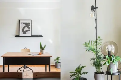 a desk with potted plants in a room at Radiant Retreat in Paleo Faliro by UPSTREET in Athens