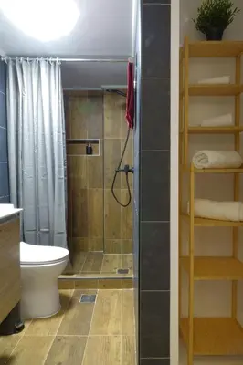 a bathroom with a shower and a toilet and a sink at You & Me Cozy Apartments BY ZAIN in Athens