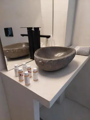 a bathroom with a large bowl sink on a counter at Golden Star Praxitelous in Agia Marina Aegina