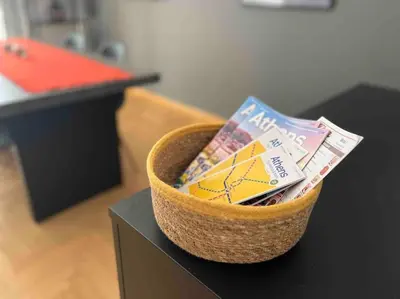 a basket filled with money sitting on top of a table at Stylish Central Cozy one BEDROOM Apartment in Athens