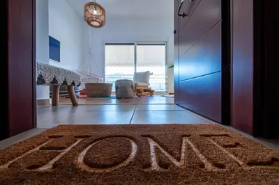 a house with the word eviction written on a rug at Piraeus Urban Gem in Piraeus