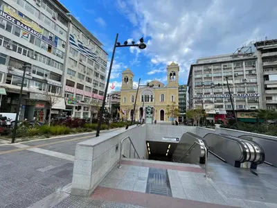 a city street with a building in the background at Piraeus Urban Gem in Piraeus