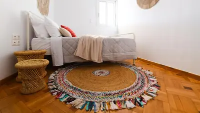 a living room with a rug on the floor at Piraeus Urban Gem in Piraeus