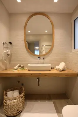 a bathroom with a sink and a mirror at Joy Luxury Central Apartment in Athens