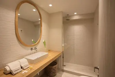 a bathroom with a sink and a mirror at Central Luxury Apartment Love in Athens