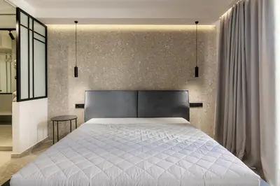 a bedroom with a large bed in a room at Kolonaki Square Central Penthouse in Athens