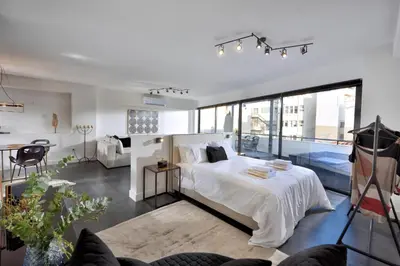 a bedroom with a white bed and a large window at Stunning Athens Penthouse Apartment Historic Central Location Albus Senior in Athens