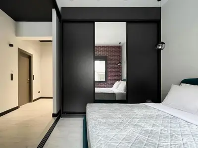 a bedroom with black walls and a bed with a mirror at Lucky New Home #01 VIPGreece in Athens