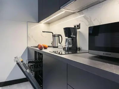 a kitchen with a counter top with a coffee maker at Lucky New Home #01 VIPGreece in Athens