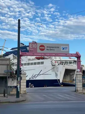 a large boat is docked at a dock at FKVILLAS-K-1 in Piraeus
