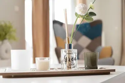 a tray with a vase with a flower and two glasses at Breathtaking view apartment in Glyfada (AS_D1) in Athens