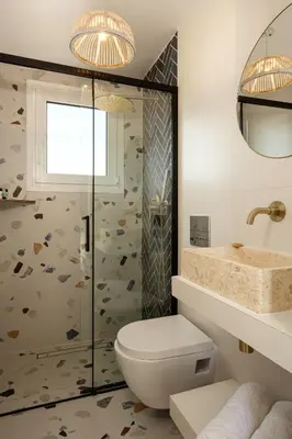 a bathroom with a toilet and a shower at Rooftops of Athens - Areos Studio Jacuzzi & View in Athens