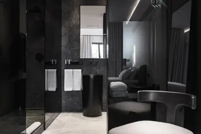 a bathroom with a sink and a mirror at Maison7 - Acropolis in Athens