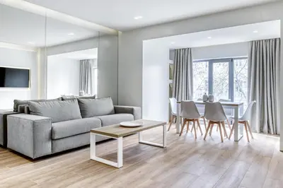 a living room with a couch and a table at Nsplace in Athens