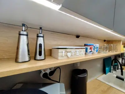 a kitchen with two coffee makers on a wooden shelf at Floral Home 1 - ground floor apt, private parking! in Athens