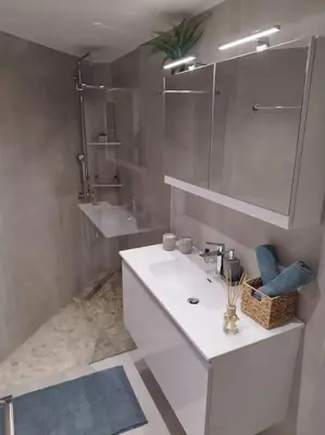 a white bathroom with a sink and a mirror at Floral Home 1 - ground floor apt, private parking! in Athens