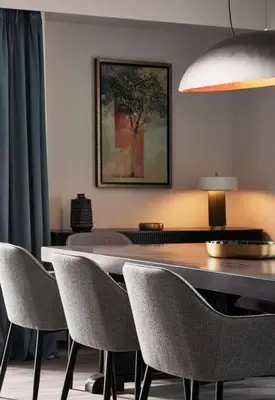a dining room with a table and chairs at Acropolis Grand Suite in Athens