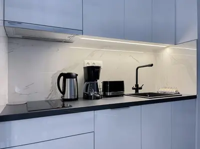 a kitchen with a counter top with a coffee maker at Lucky Premium Home #11 VIPGreece in Athens