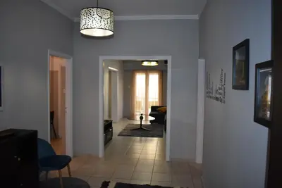 a room with a hallway with a living room at Cozy Project Kaisariani in Athens
