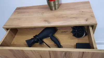a wooden table with a camera on top of it at Α&J Sweet Home in Athens