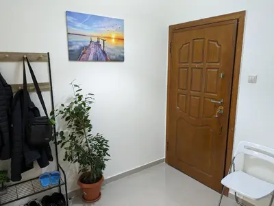 a room with a door and a picture on the wall at Lavender-Emma cosy apartment near city center in Athens