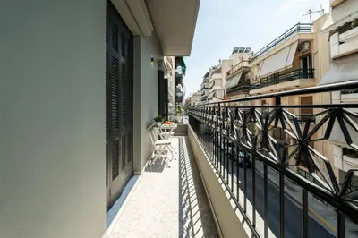 a balcony with a view of a street at Ranny House in Athens