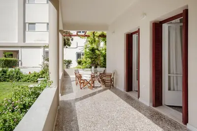 an external view of a house with a patio at Private house - Garden - Glyfada in Athens