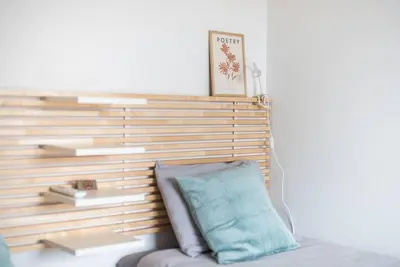 a pillow sitting on top of a bed in a room at Open -view Apartment, YGEIA Hospital in Athens