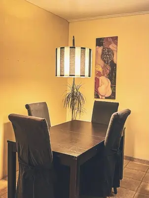 a dining room with a table and chairs at Villa Infinity View Athens Riviera in Anavissos