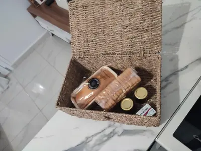 a basket with some items in it on a counter at Elegant & Modern Apartment near to Athens Riviera in Piraeus