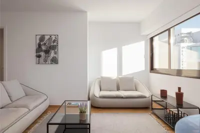 a living room with two couches and a table at Syntagma Unique Penthouse in Athens