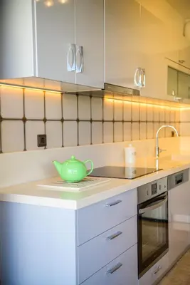 a kitchen with a green pot on the stove at Batis Sea View in Athens