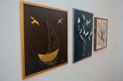 a group of framed pictures of a boat on a wall at Lovely,central, spacious 2-bedrooms apartment in Piraeus