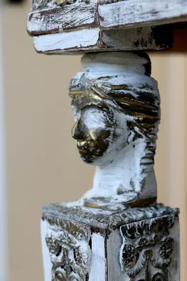 a statue of a head on a pillar at Luxurious studio apartment close to the beach and airport in Porto Rafti