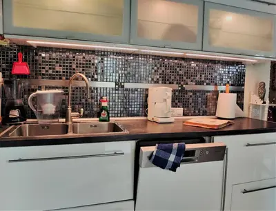 a kitchen with a sink and a counter top at Κατερινα in Athens