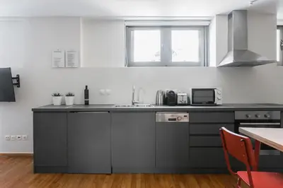 a kitchen with a sink and a counter top at The Hill by Zoia Living in Athens