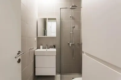 a bathroom with a shower and a toilet and a sink at The Hill by Zoia Living in Athens