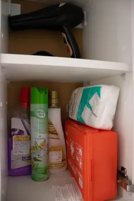 a refrigerator with some food items on a shelf at Moon Haven Near Acropolis with 100Mbps WiFi in Athens