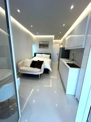a bedroom with a bed and a kitchen with a sink at Boutique3436 Luxury Apartment in Athens
